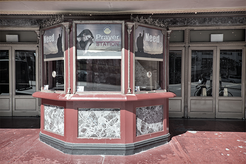 Box office of an old theater converted to a prayer station.