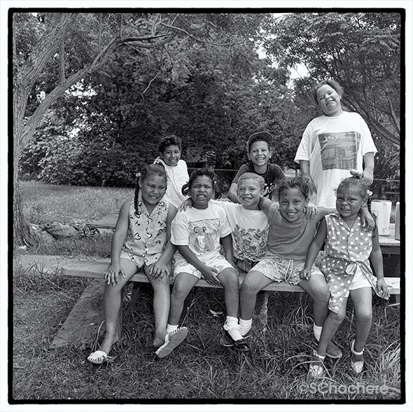 Group of children at picnic table
