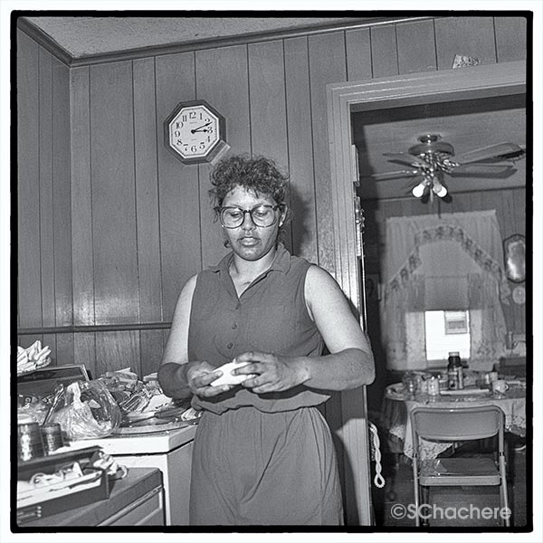 Woman standing in kitchen