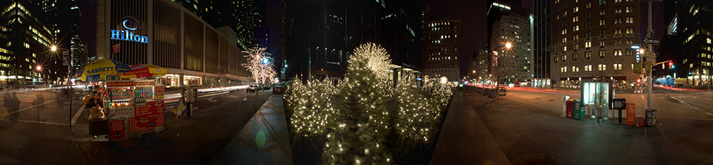 Panoramic view of 54th and 6th in New York City at night