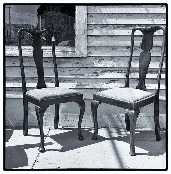 Chairs on display in front of store