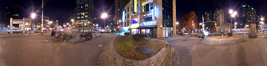 Panoramic view of Confucius Square, New York City, at night